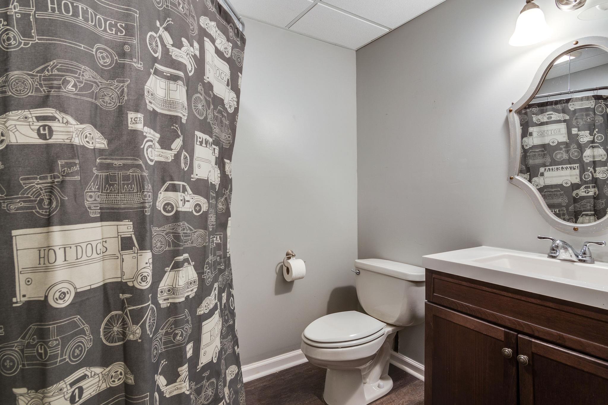 1675 Center Star Road Columbia, TN 38401 - Photo 18 of 21 a bathroom with a sink toilet and mirror