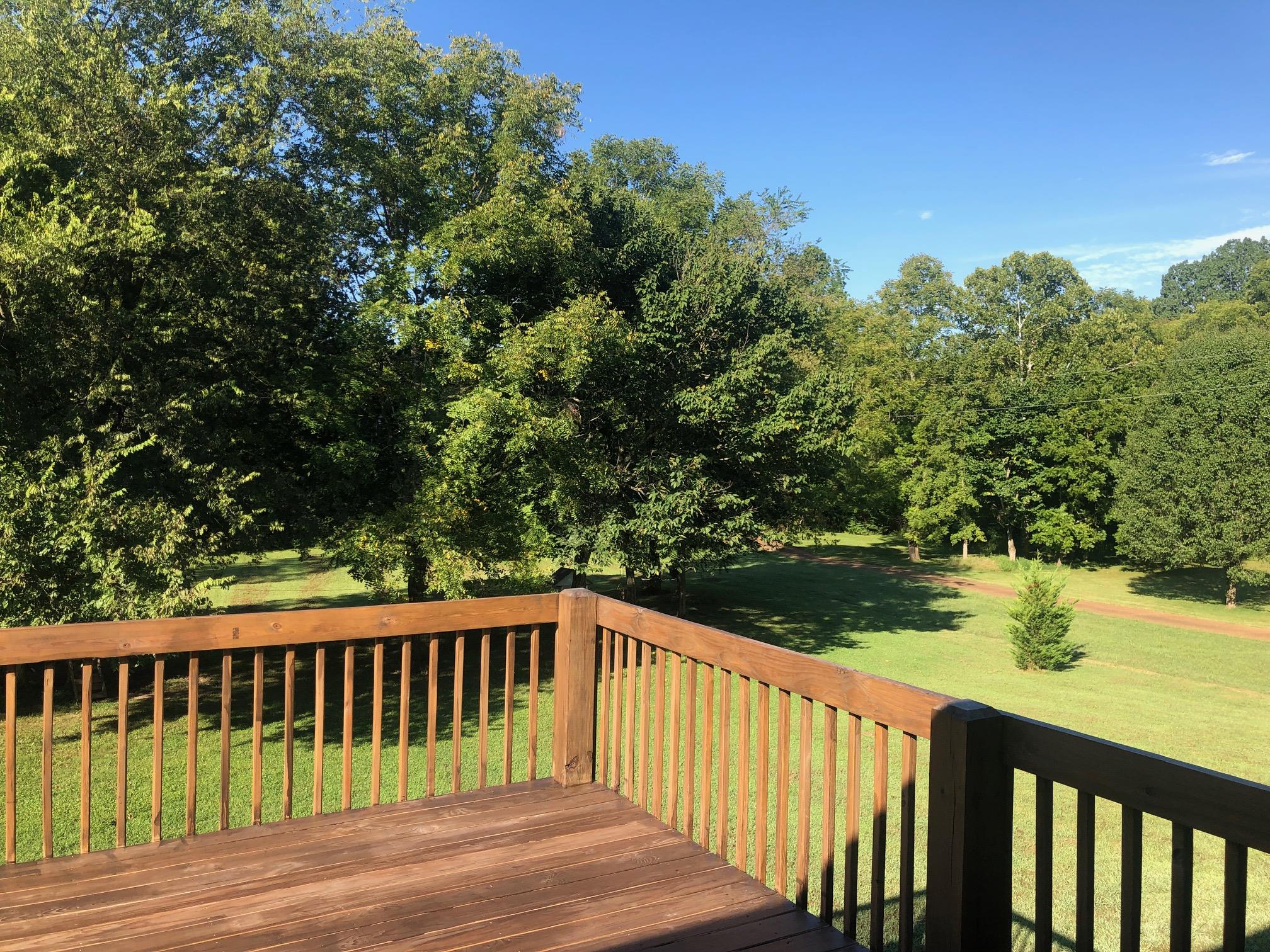 1675 Center Star Road Columbia, TN 38401 - Photo 4 of 21 a view of balcony with wooden floor and outdoor space
