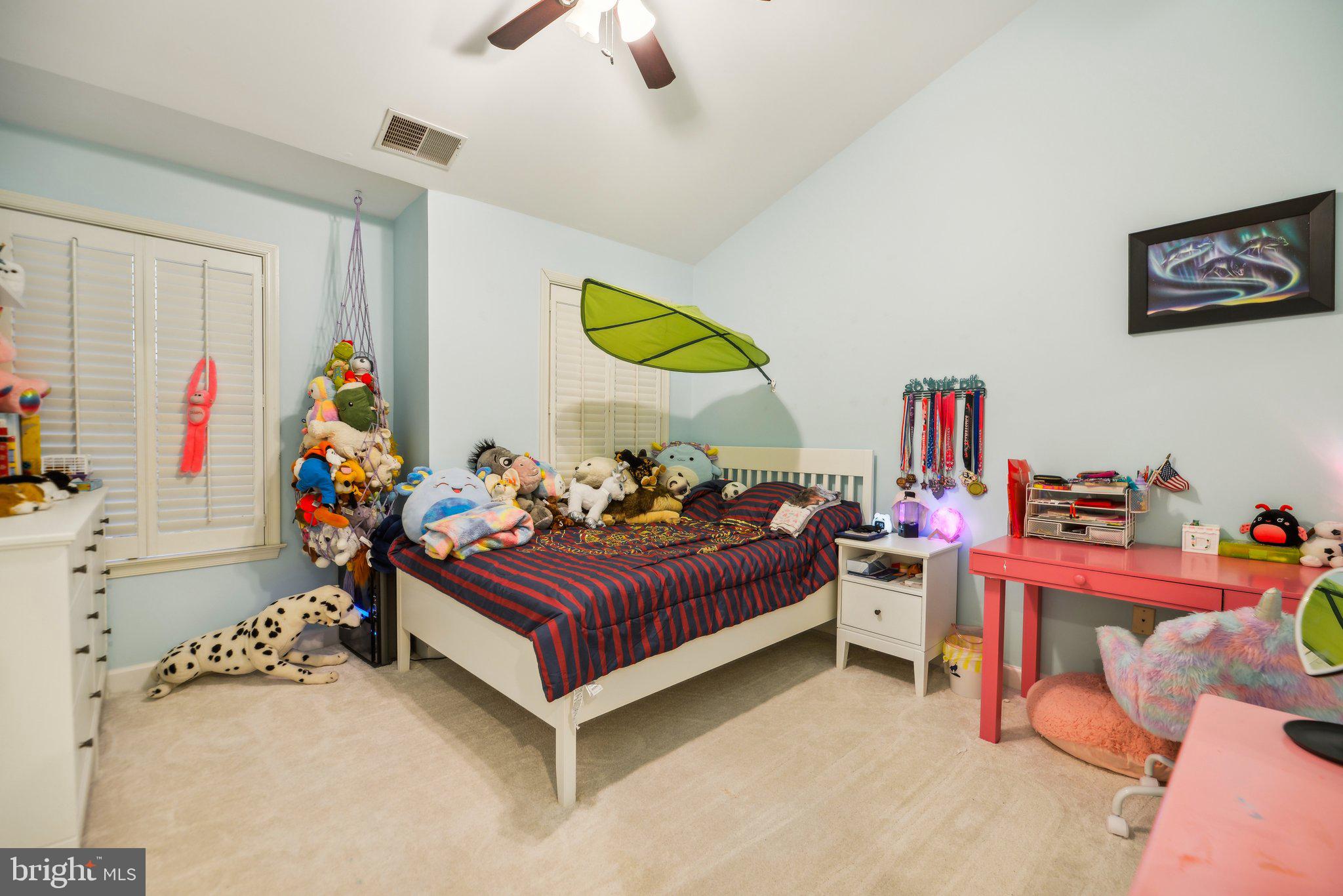 47753 Ramshead Terrace Sterling, VA 20165 - Photo 20 of 37 a bedroom with a bed and a window