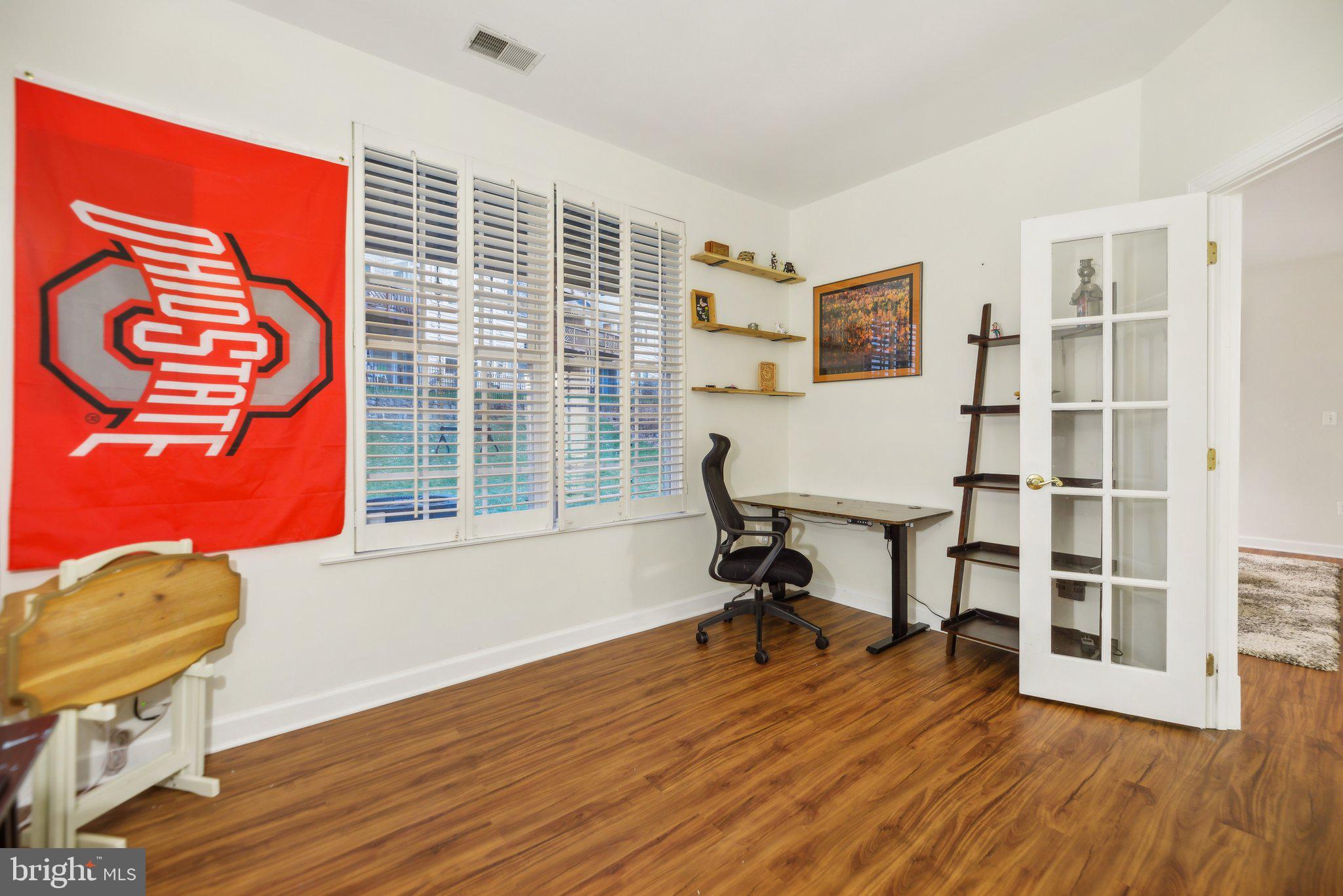 47753 Ramshead Terrace Sterling, VA 20165 - Photo 26 of 37 a view of a workspace with furniture and a window