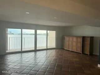a kitchen with stainless steel appliances granite countertop a sink and a microwave