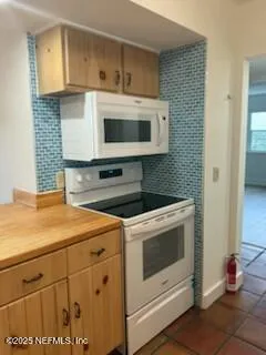 a view of a livingroom with a flat screen tv