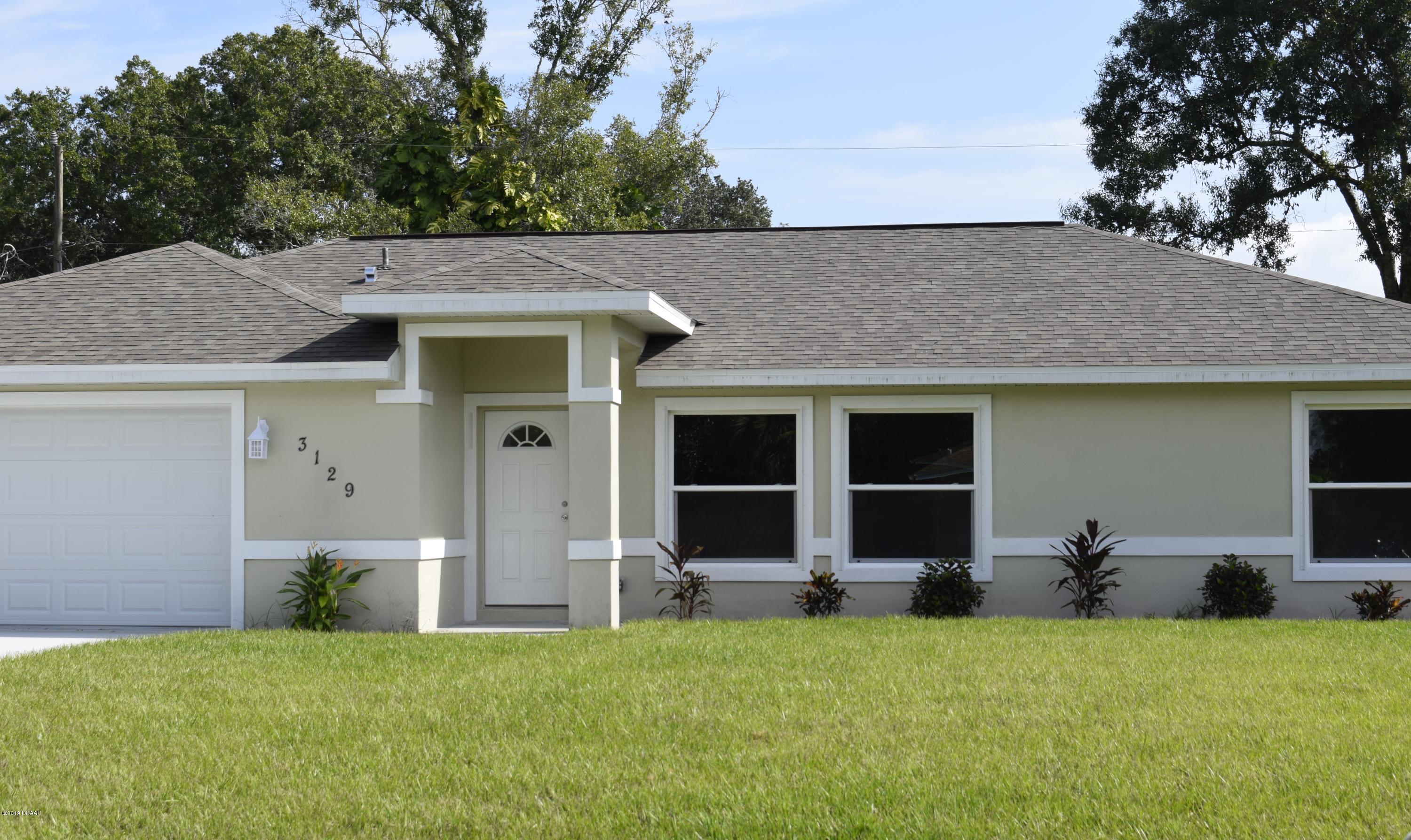 3129 Pine Tree Drive Edgewater, FL 32141 - Photo 1 of 22 Front