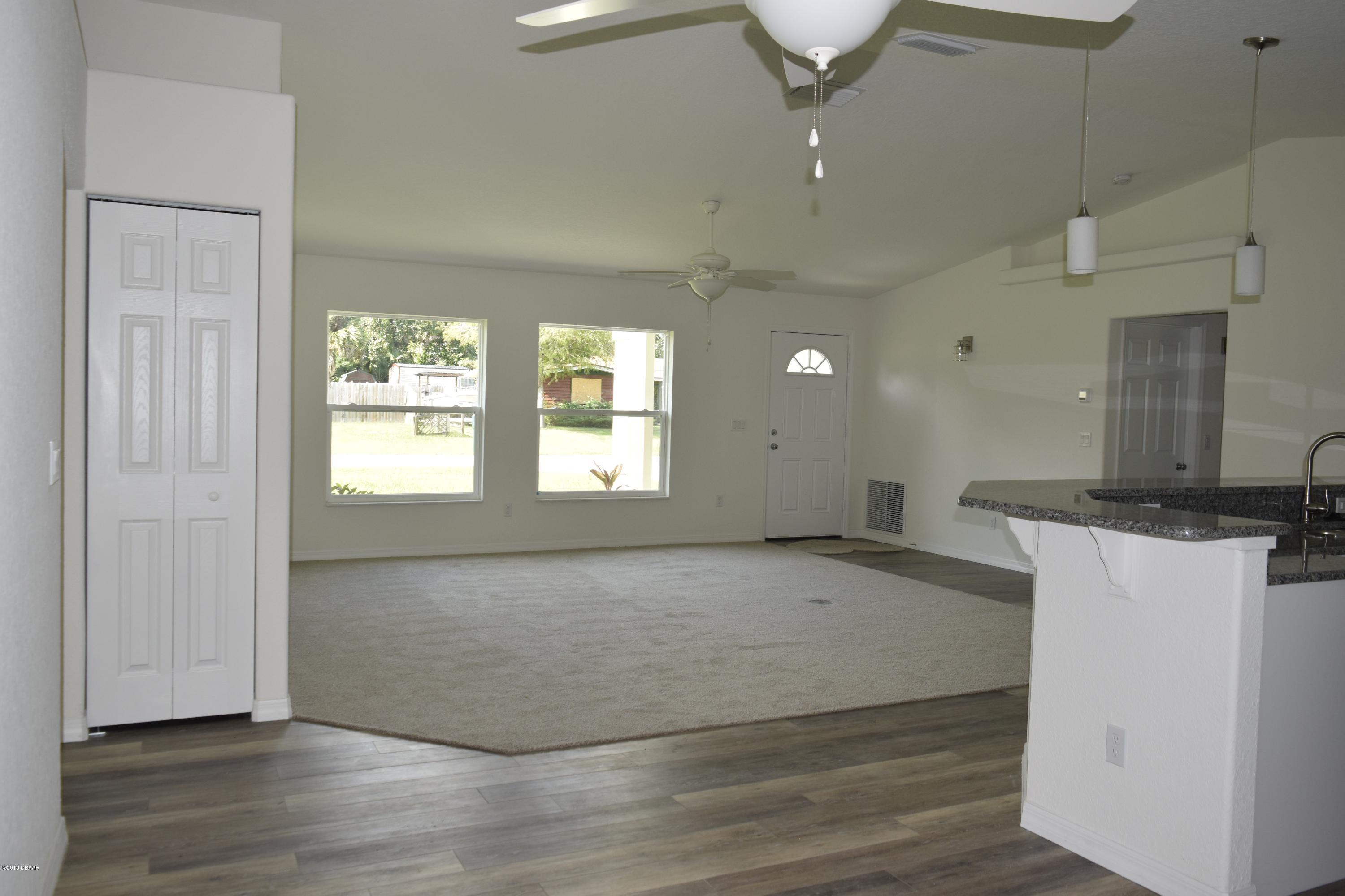 3129 Pine Tree Drive Edgewater, FL 32141 - Photo 11 of 22 Living Room