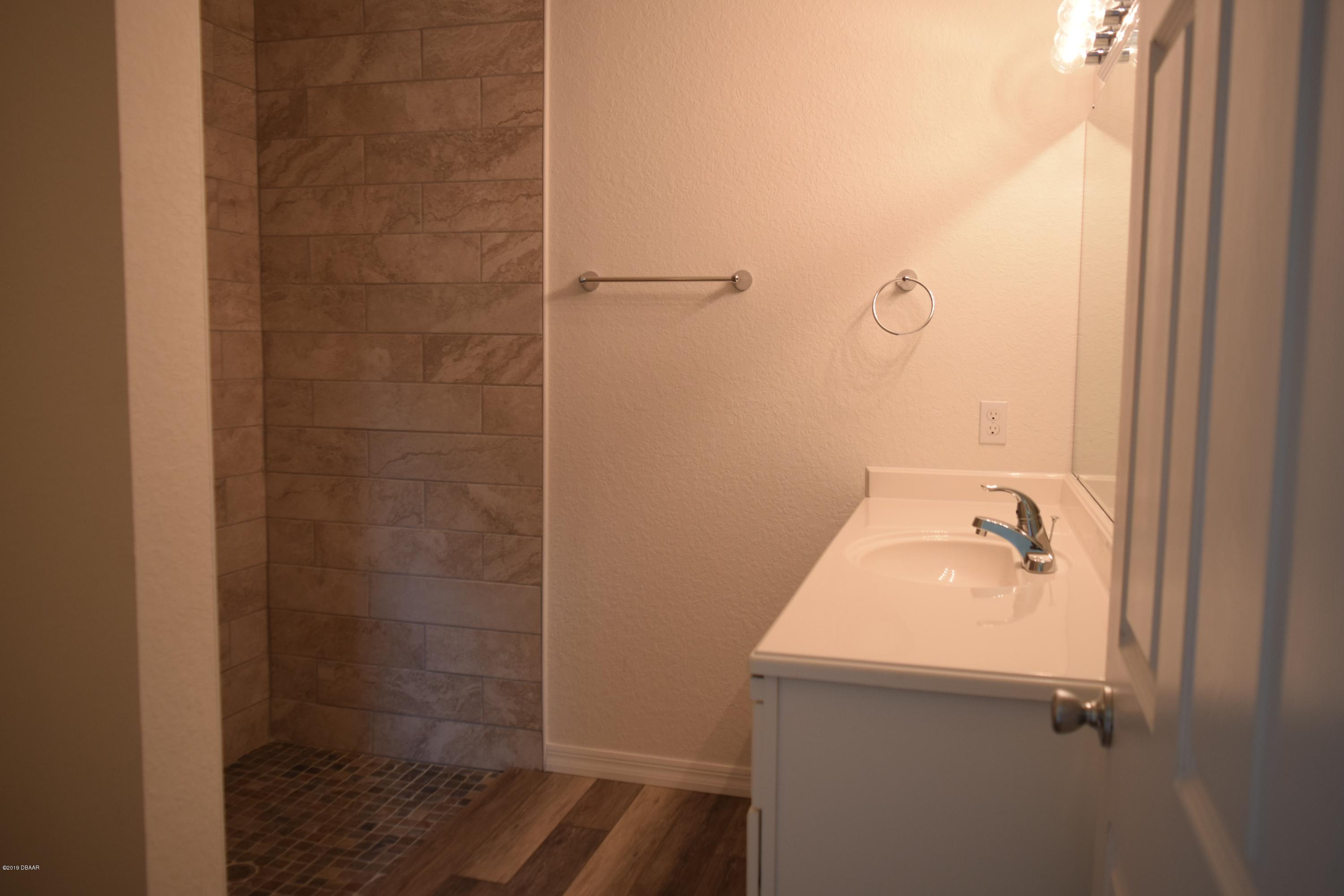 3129 Pine Tree Drive Edgewater, FL 32141 - Photo 13 of 22 master bathroom