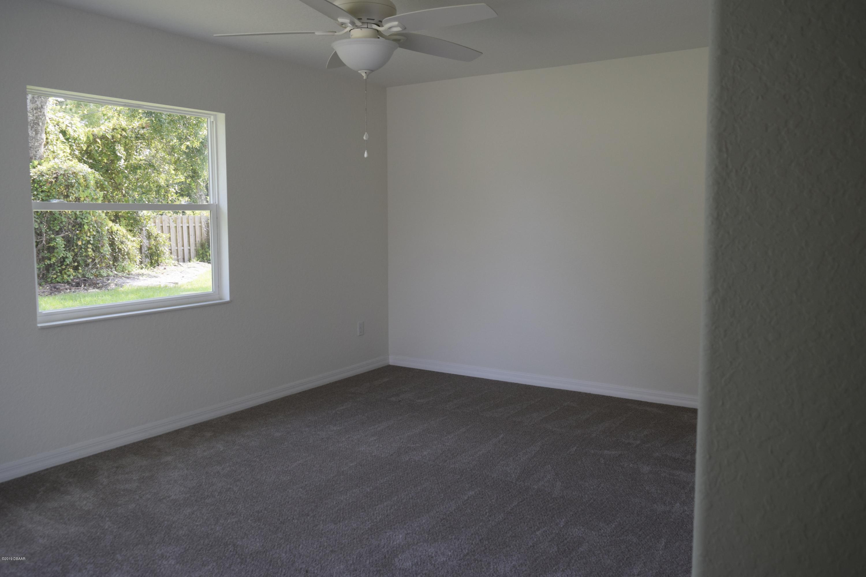 3129 Pine Tree Drive Edgewater, FL 32141 - Photo 16 of 22 spare bedroom 2