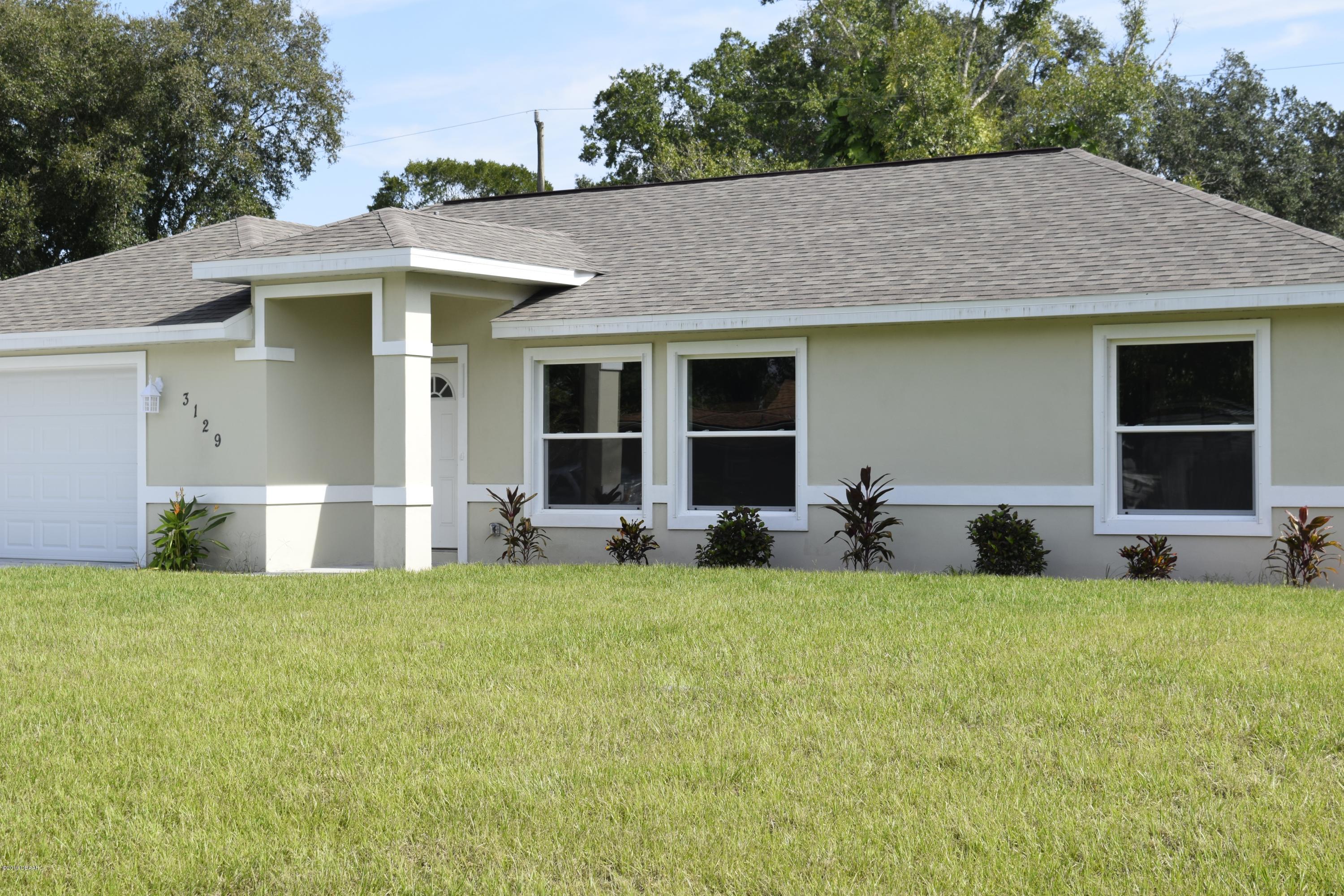 3129 Pine Tree Drive Edgewater, FL 32141 - Photo 2 of 22 Front 2