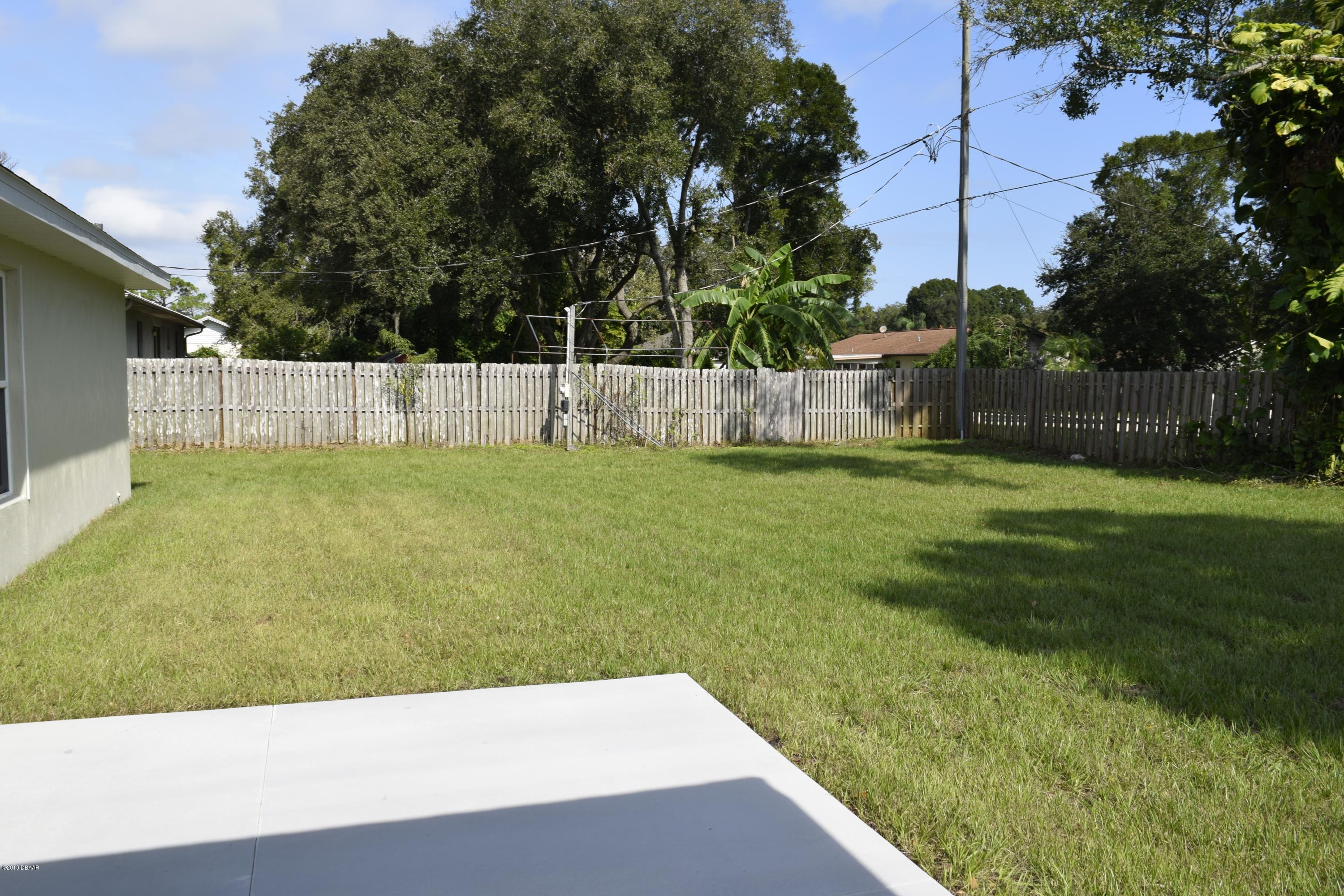 3129 Pine Tree Drive Edgewater, FL 32141 - Photo 20 of 22 back yard