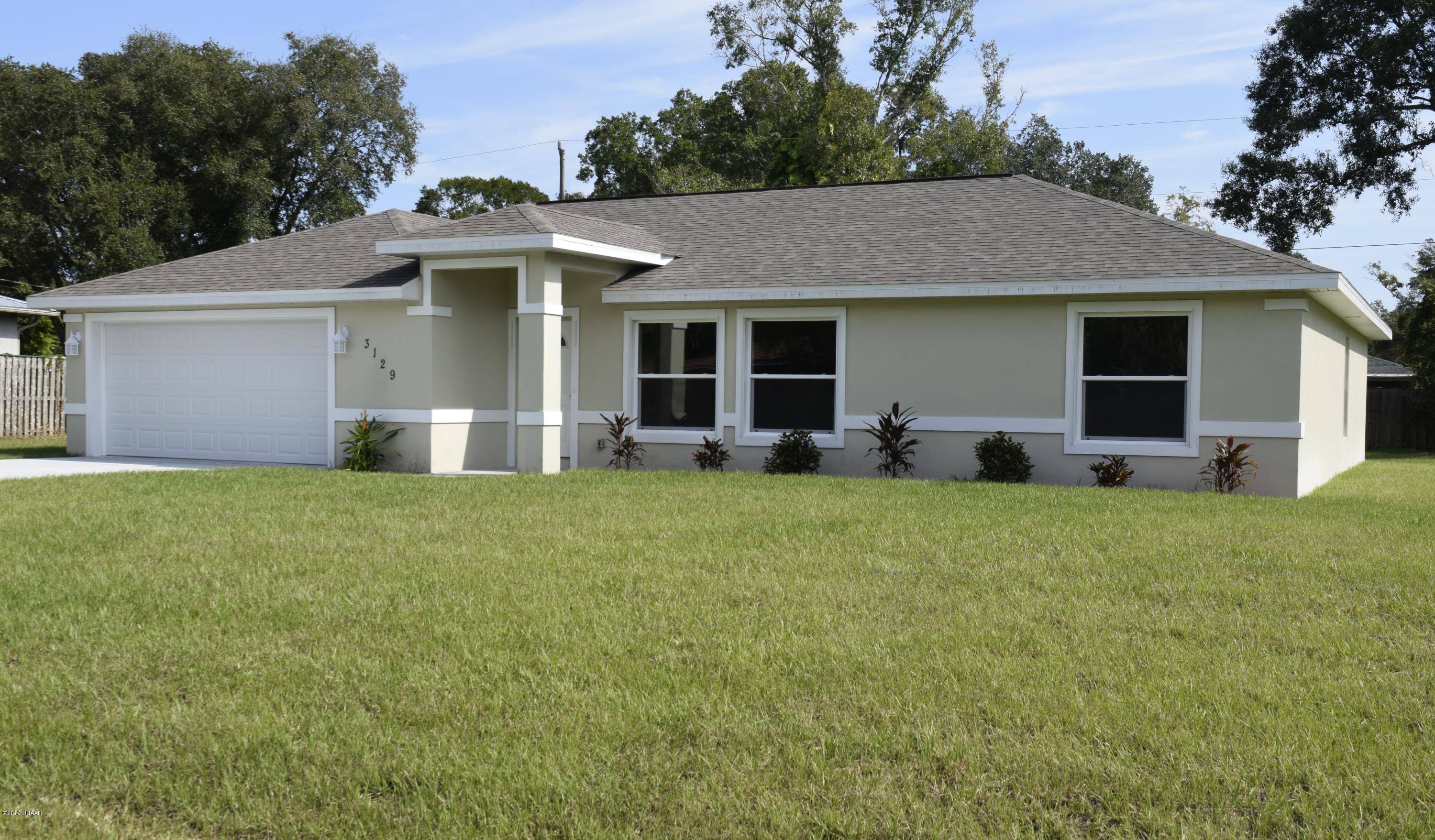 3129 Pine Tree Drive Edgewater, FL 32141 - Photo 3 of 22 Front 3