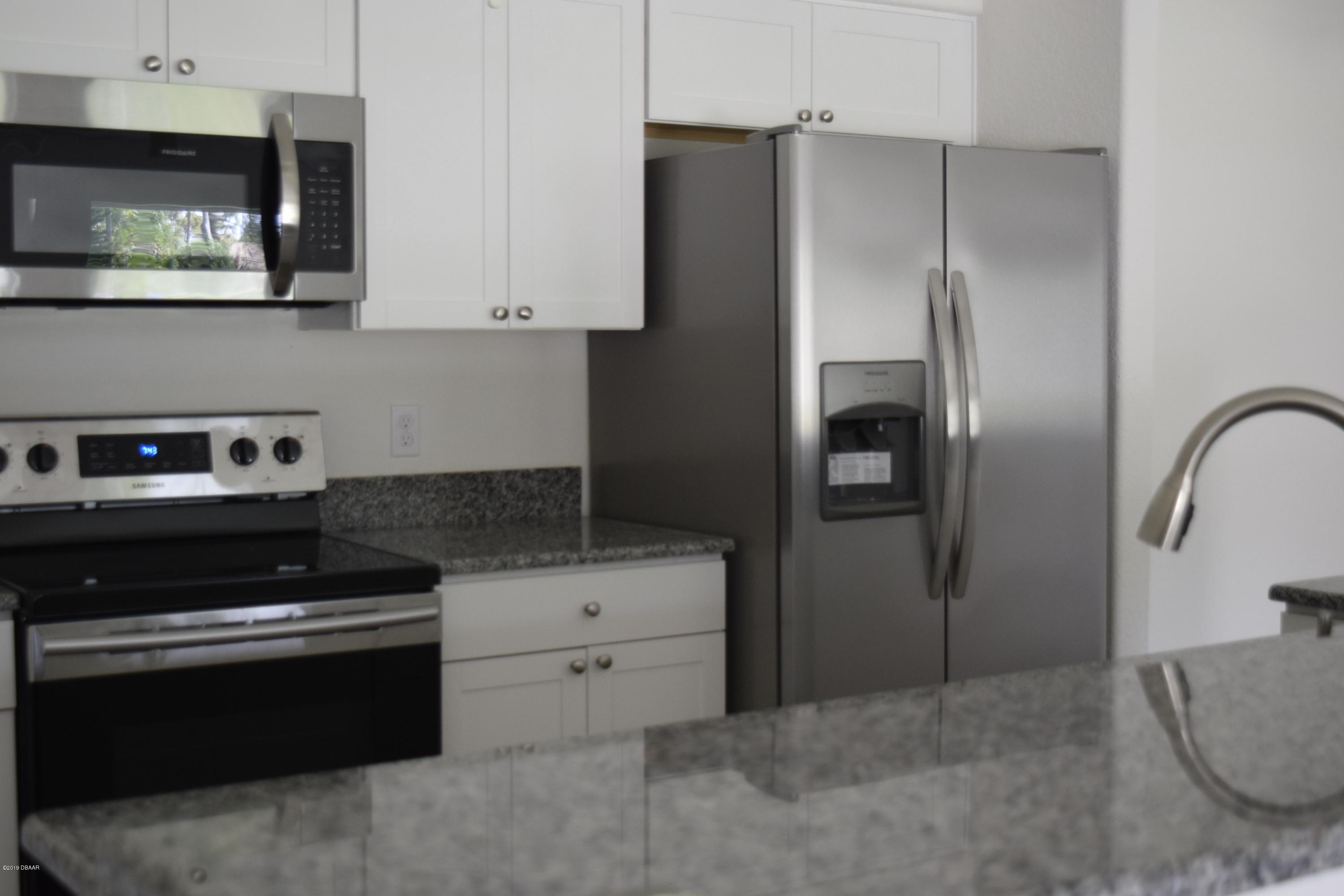 3129 Pine Tree Drive Edgewater, FL 32141 - Photo 8 of 22 kitchen space
