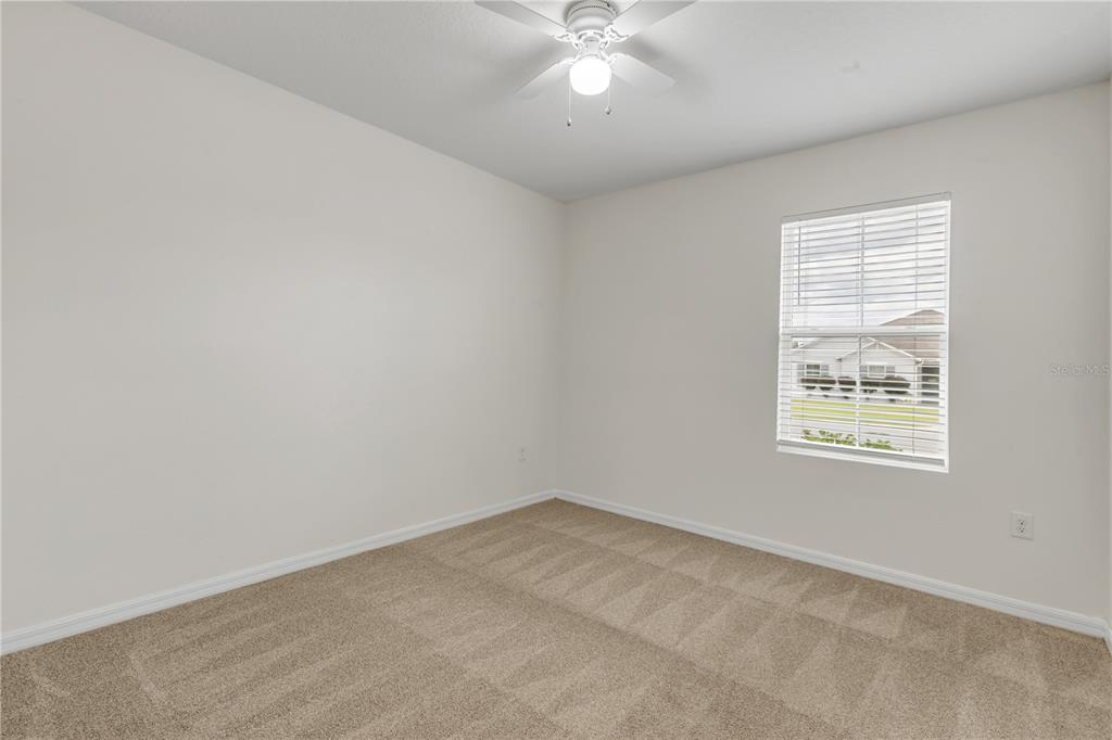 48 Hickory Loop Ocala, FL 34472 - Photo 37 of 52 an empty room with a window