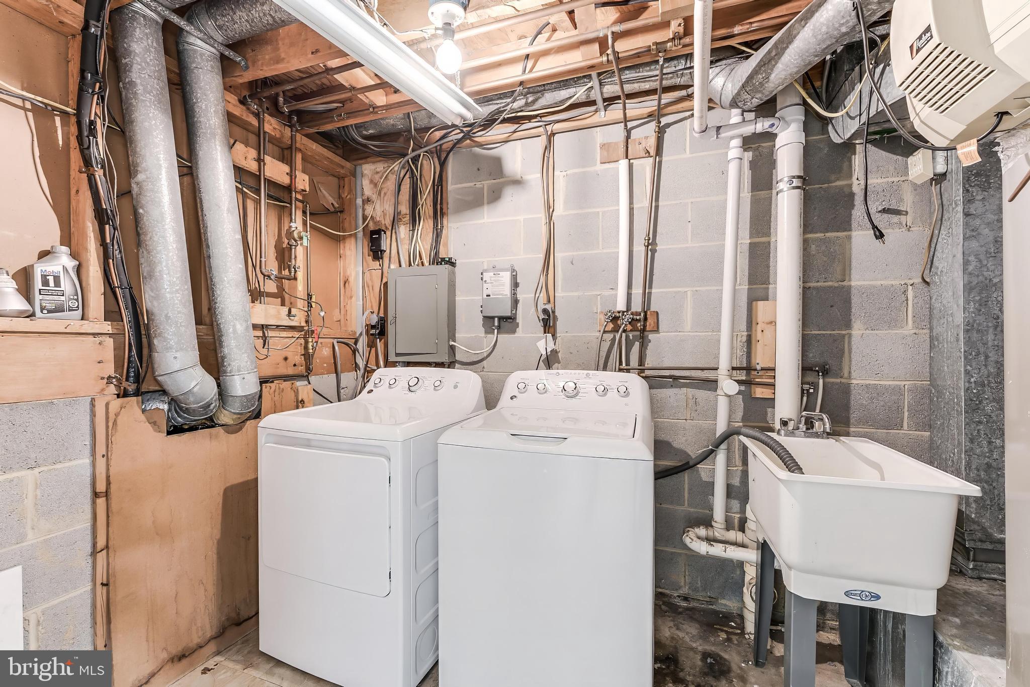 2331 Harleyford Court Reston, VA 20191 - Photo 35 of 40 Functional laundry space in the basement.