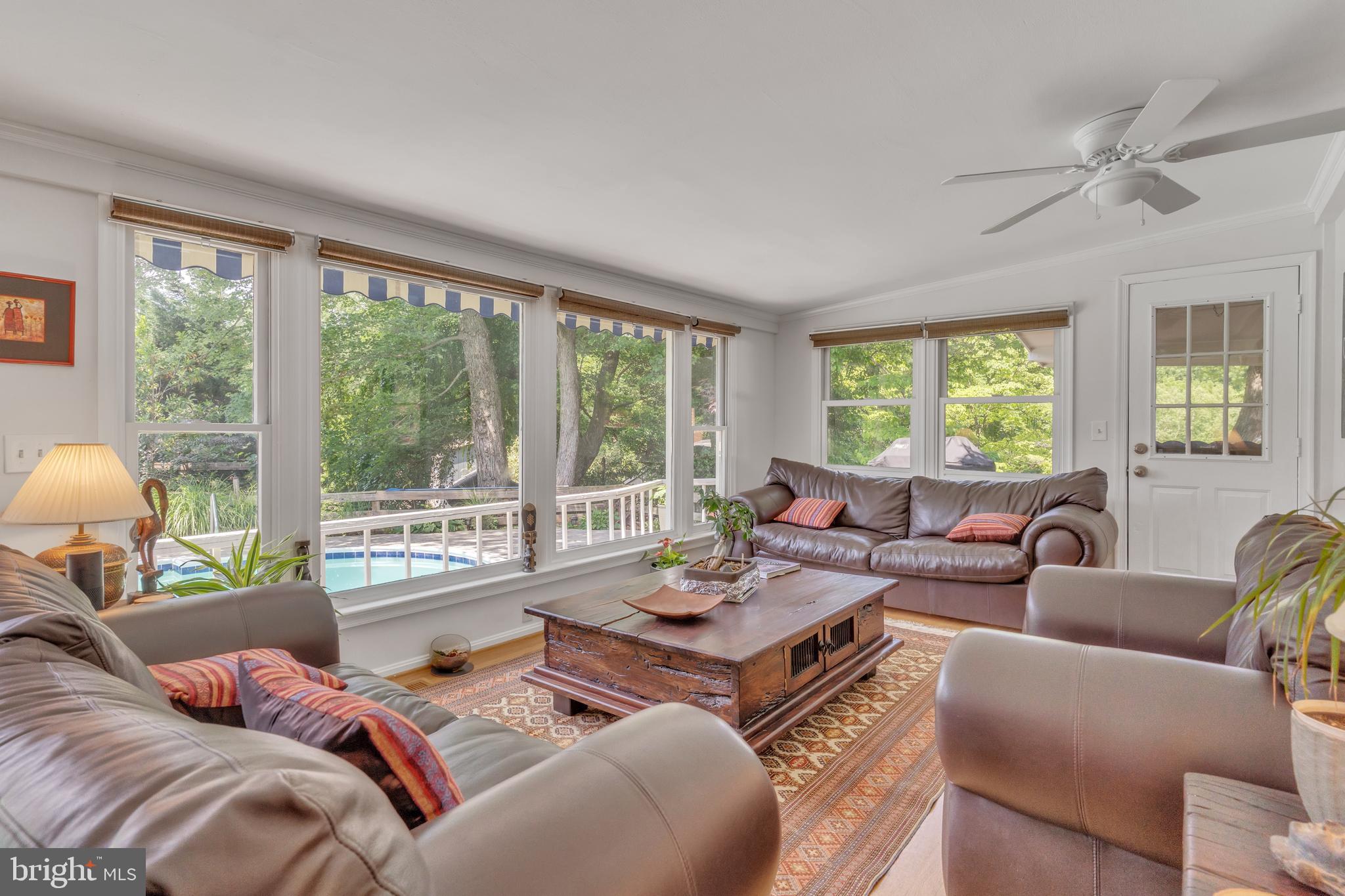 9329 Harvey Road Silver Spring, MD 20910 - Photo 15 of 40 a living room with furniture and a large window