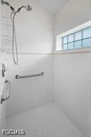 a view of an outdoor dining space with a table and chairs