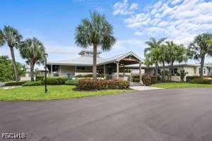 a childrens park with lots of swings and slides