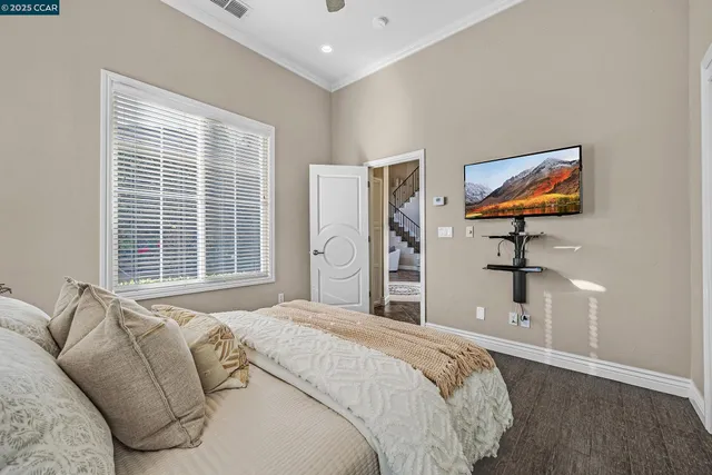 a view of a balcony with mountain view and wooden floor