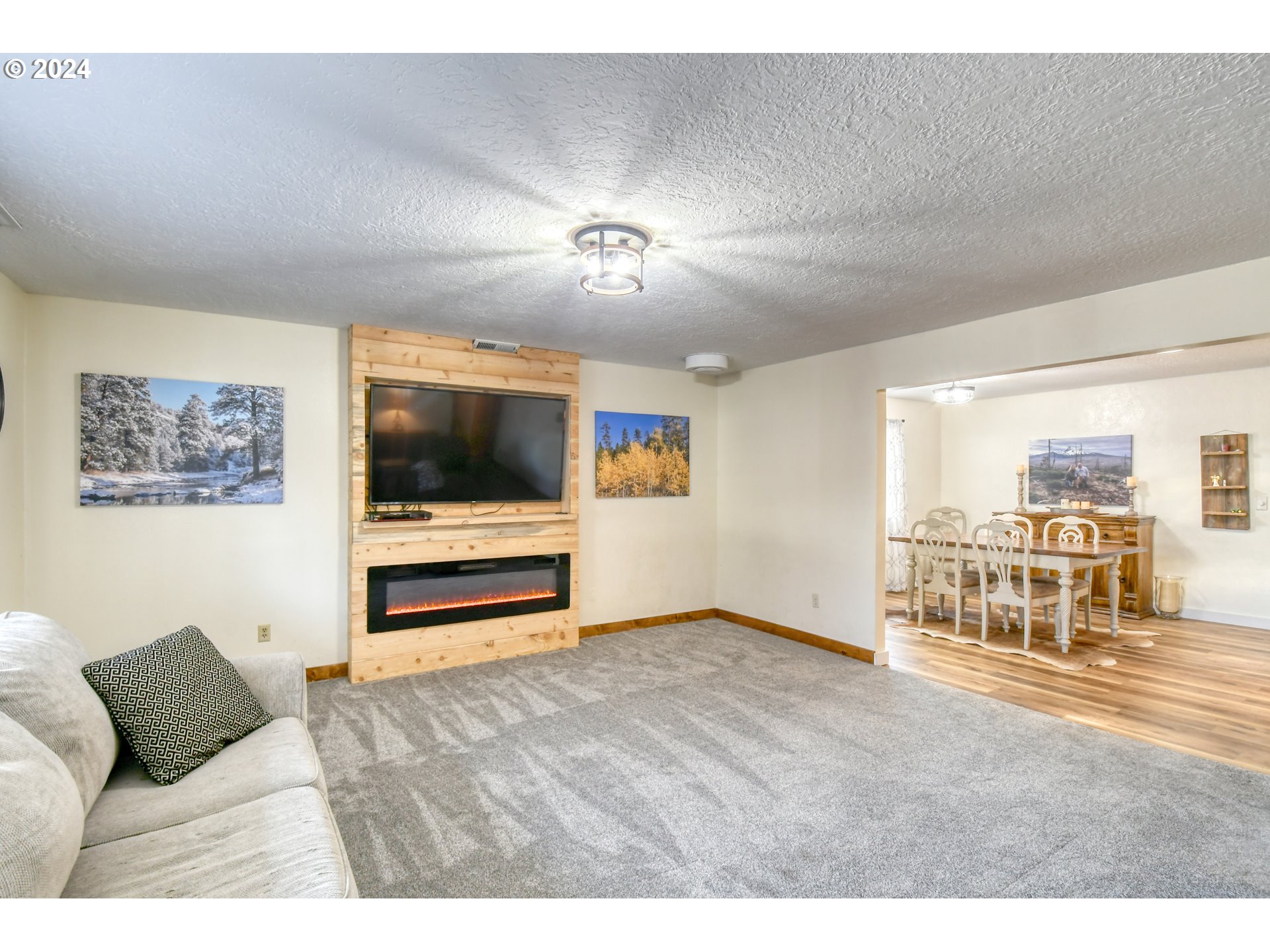 3010 Northeast Riverside Avenue Pendleton, OR 97801 - Photo 10 of 47 a living room with furniture and a flat screen tv