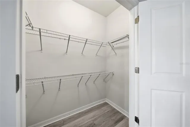 a view of a room with racks on the wall