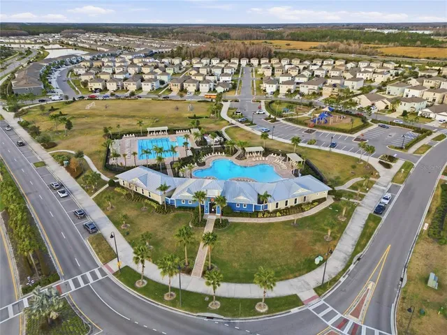 a view of a swimming pool with an ocean view