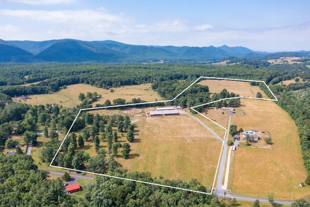 435 Lofton Road Raphine, VA 24472 - Photo 2 of 65 a view of swimming pool with a yard and mountain view