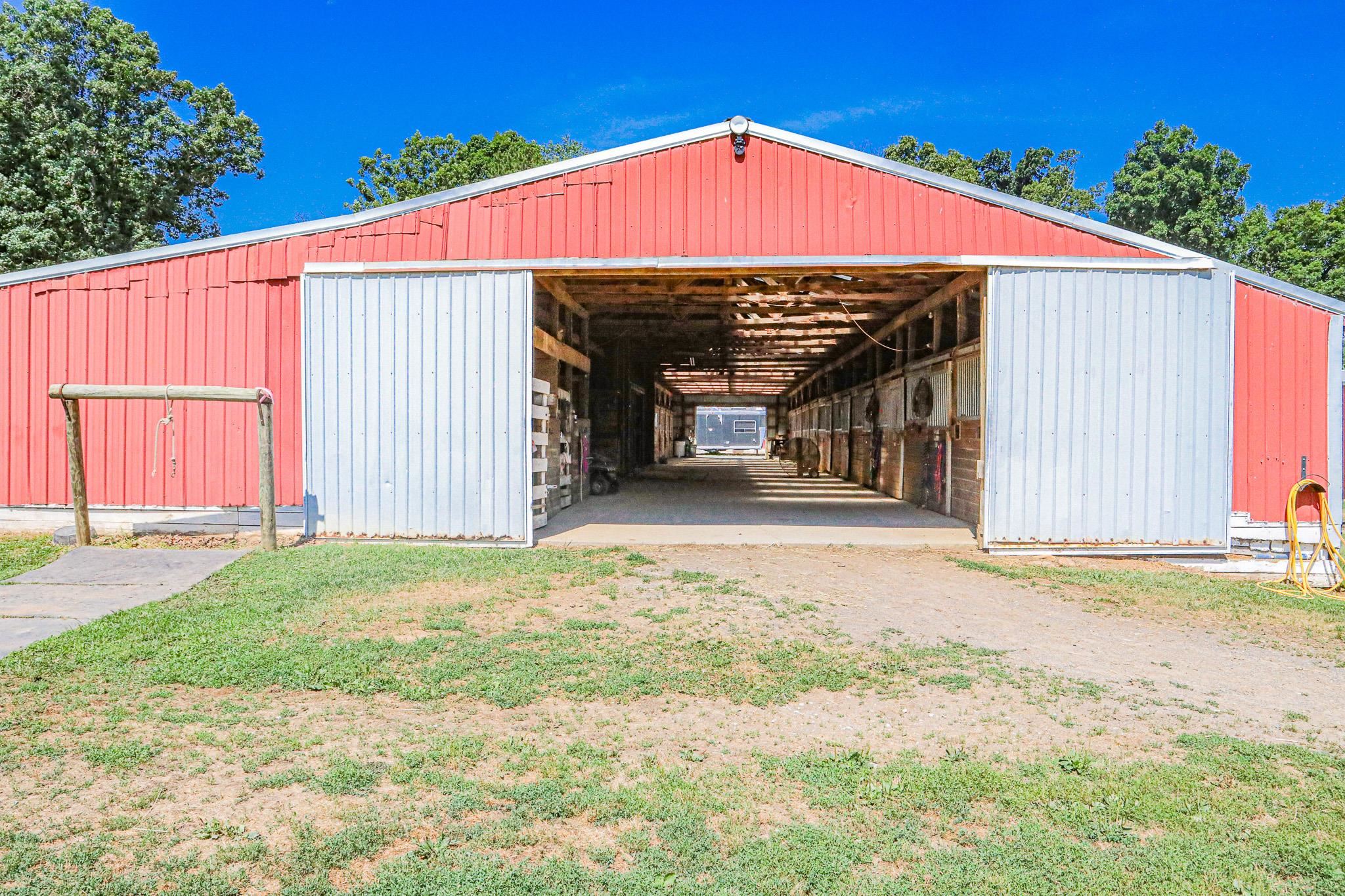435 Lofton Road Raphine, VA 24472 - Photo 30 of 65 a front view of a house with garage