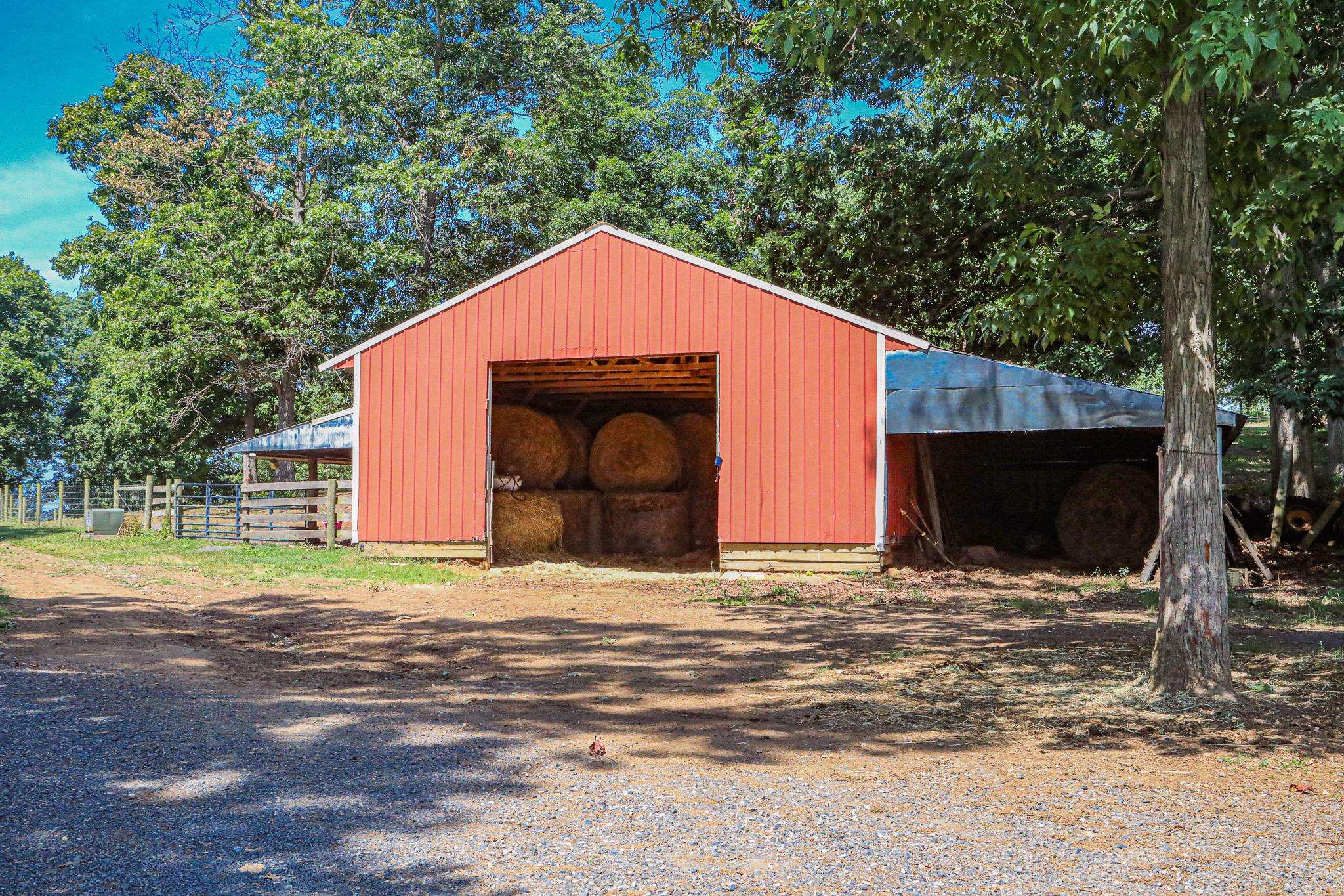 435 Lofton Road Raphine, VA 24472 - Photo 42 of 65 a view of a house with backyard and trees