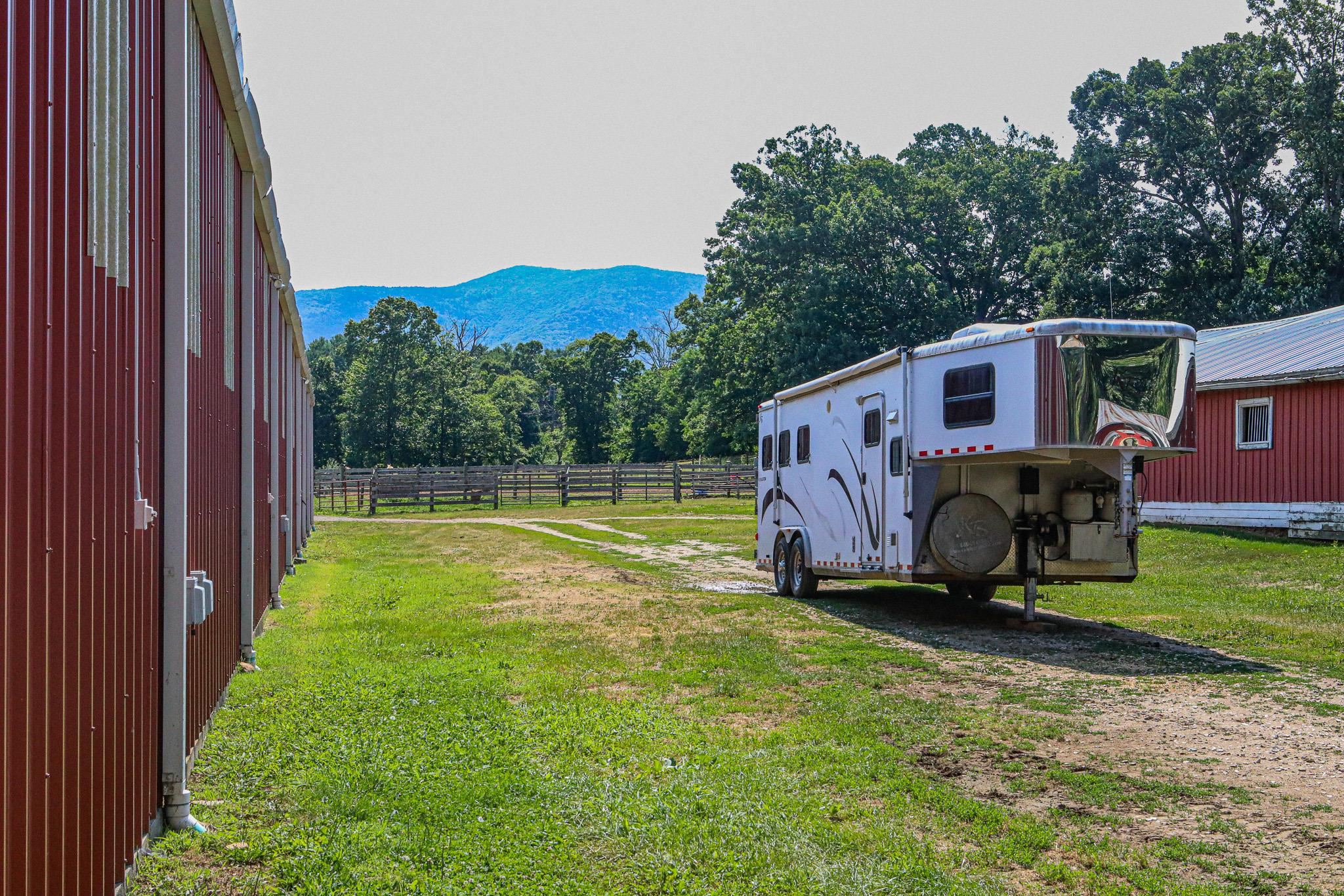 435 Lofton Road Raphine, VA 24472 - Photo 59 of 65 a view of a backyard with a small cabin