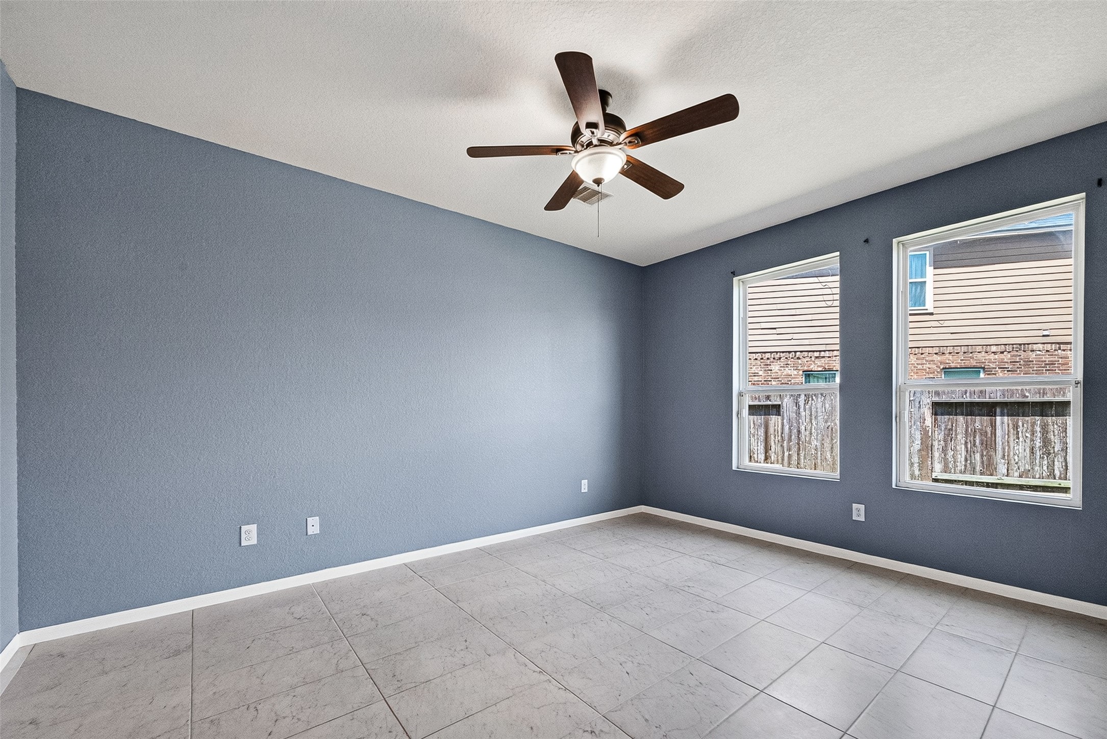 2702 Modano Court Fresno, TX 77545 - Photo 13 of 46 a view of an empty room with a window