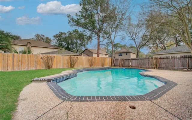 a view of a backyard with a small cabin