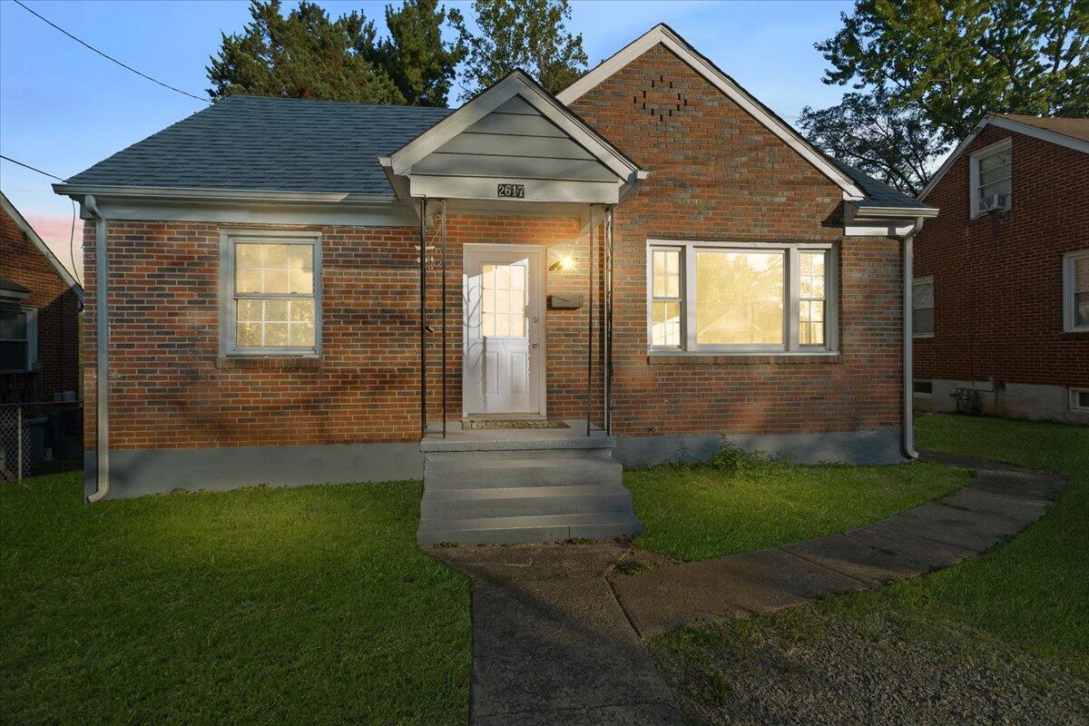 2617 Radford Road Northeast Roanoke, VA 24012 - Photo 1 of 25 a view of a house with a yard