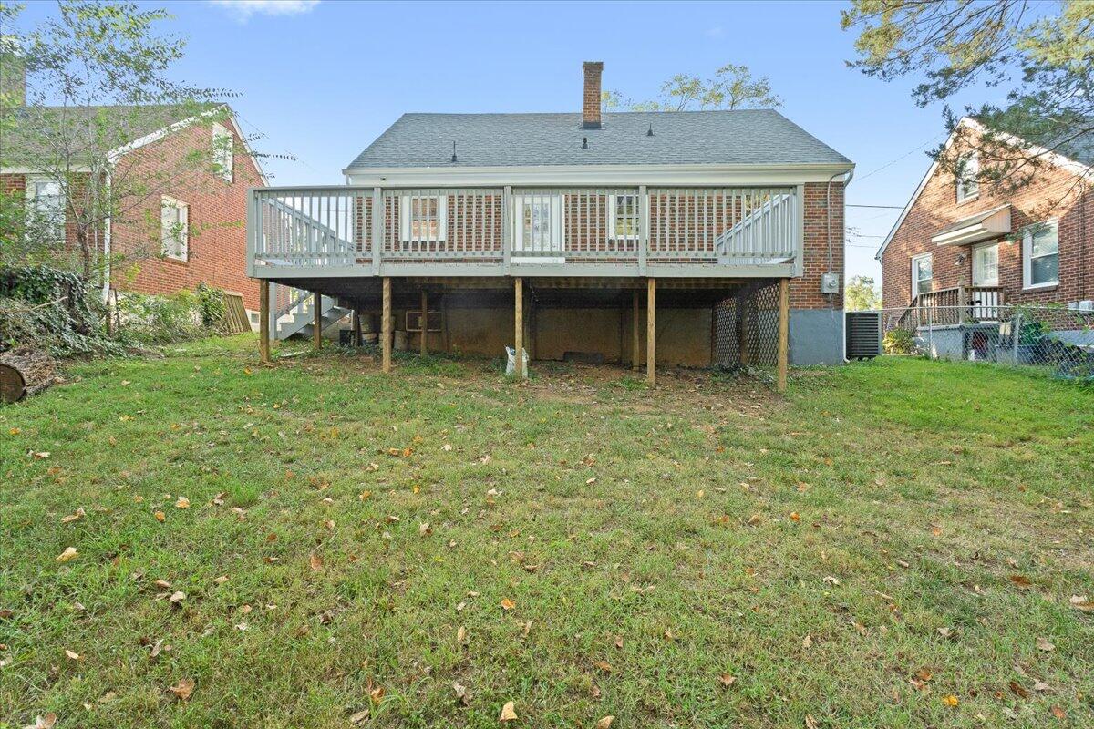 2617 Radford Road Northeast Roanoke, VA 24012 - Photo 11 of 25 a view of a house with a yard