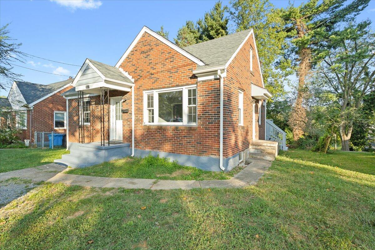 2617 Radford Road Northeast Roanoke, VA 24012 - Photo 3 of 25 a view of a house with a yard and pathway