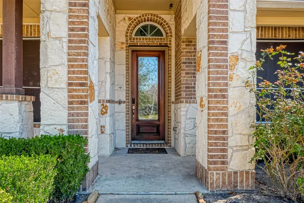 a front view of a house with a door