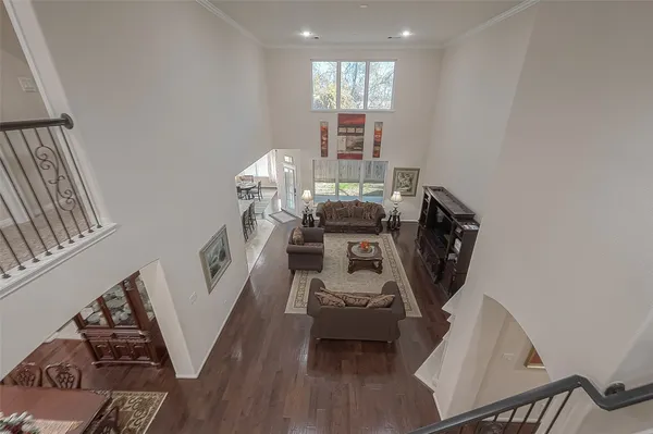 a view of a workspace with furniture and a gate