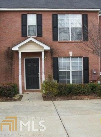 3827 Waldrop Lane, Unit 74 Decatur, GA 30034 - Photo 1 of 1 a front view of a house with garden