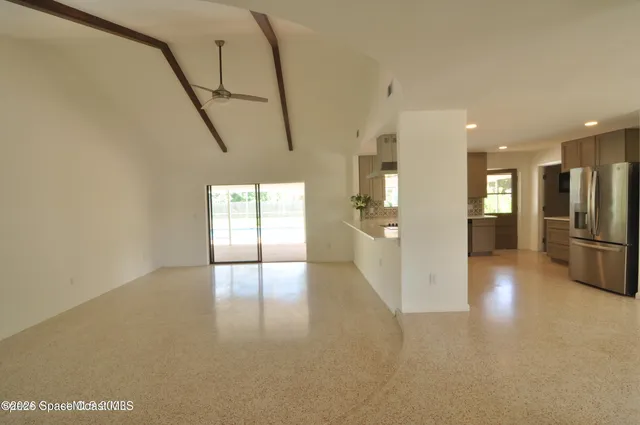 a view of a living room with a flat screen tv