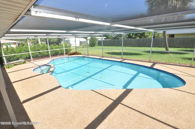 a view of a golf course with a lake view