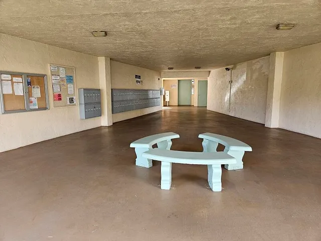 a room with furniture and wooden floor