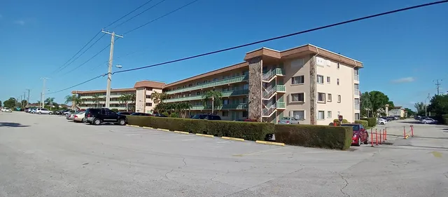a view of a building with a street