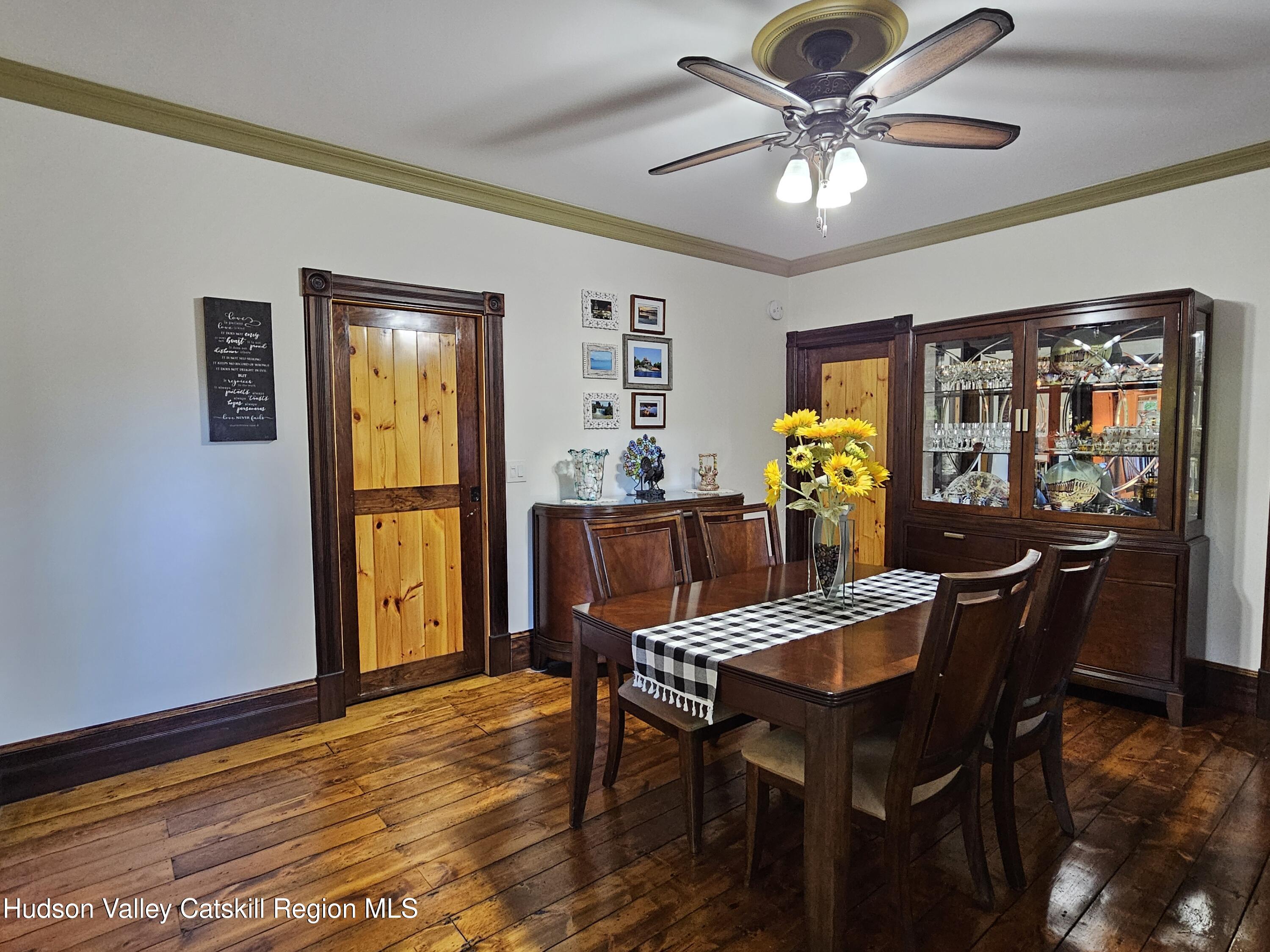 463 County Rt 46 Catskill, NY 12414 - Photo 13 of 44 a view of a dining room with furniture and chandelier