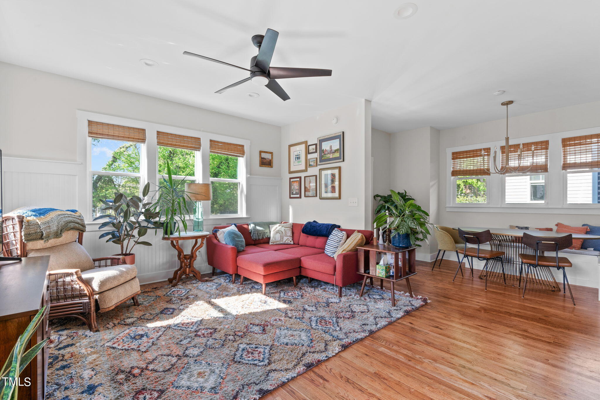 312 East Lee Street Raleigh, NC 27601 - Photo 18 of 48 a living room with furniture and wooden floor
