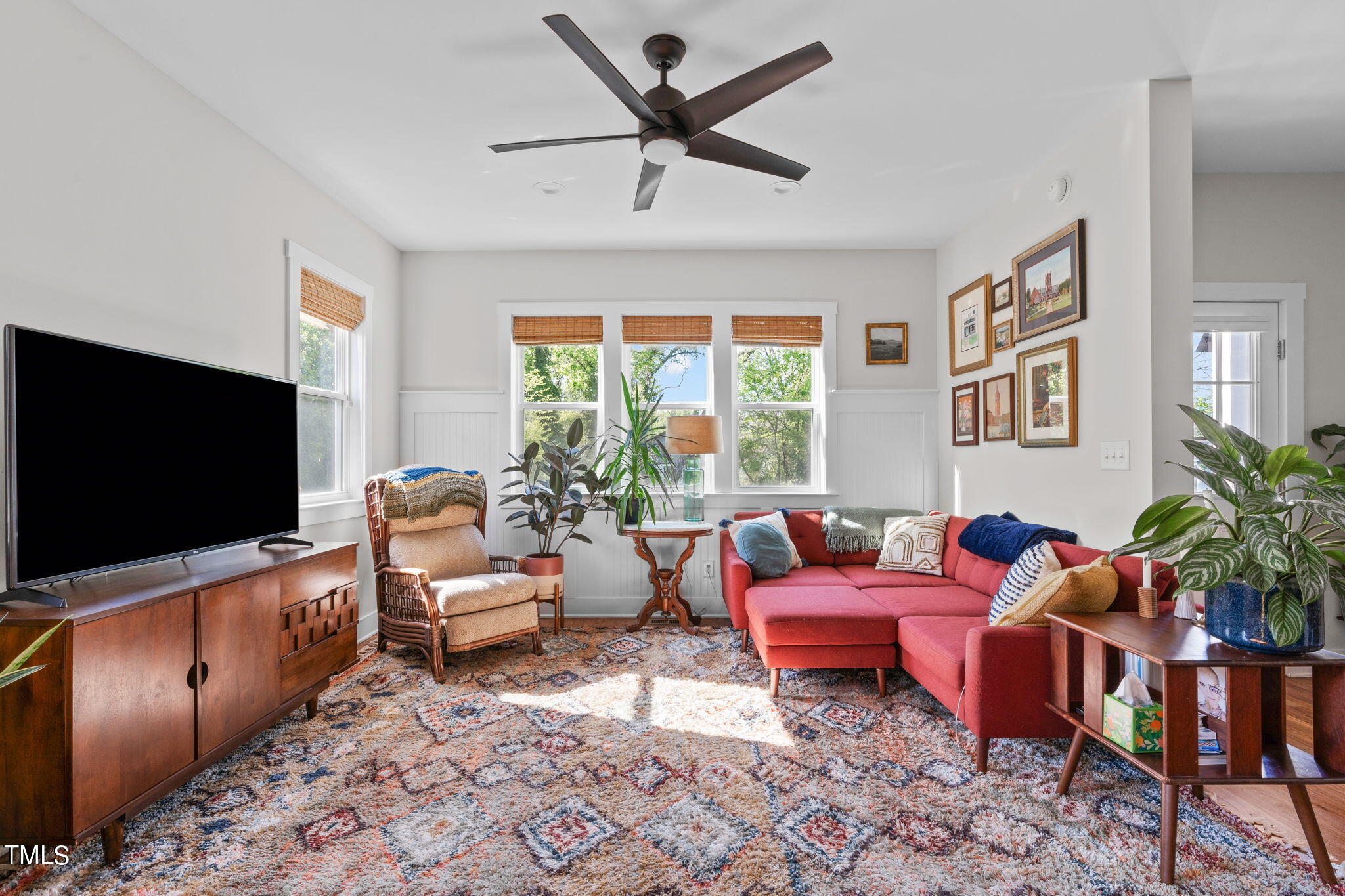 312 East Lee Street Raleigh, NC 27601 - Photo 19 of 48 a living room with furniture and a flat screen tv