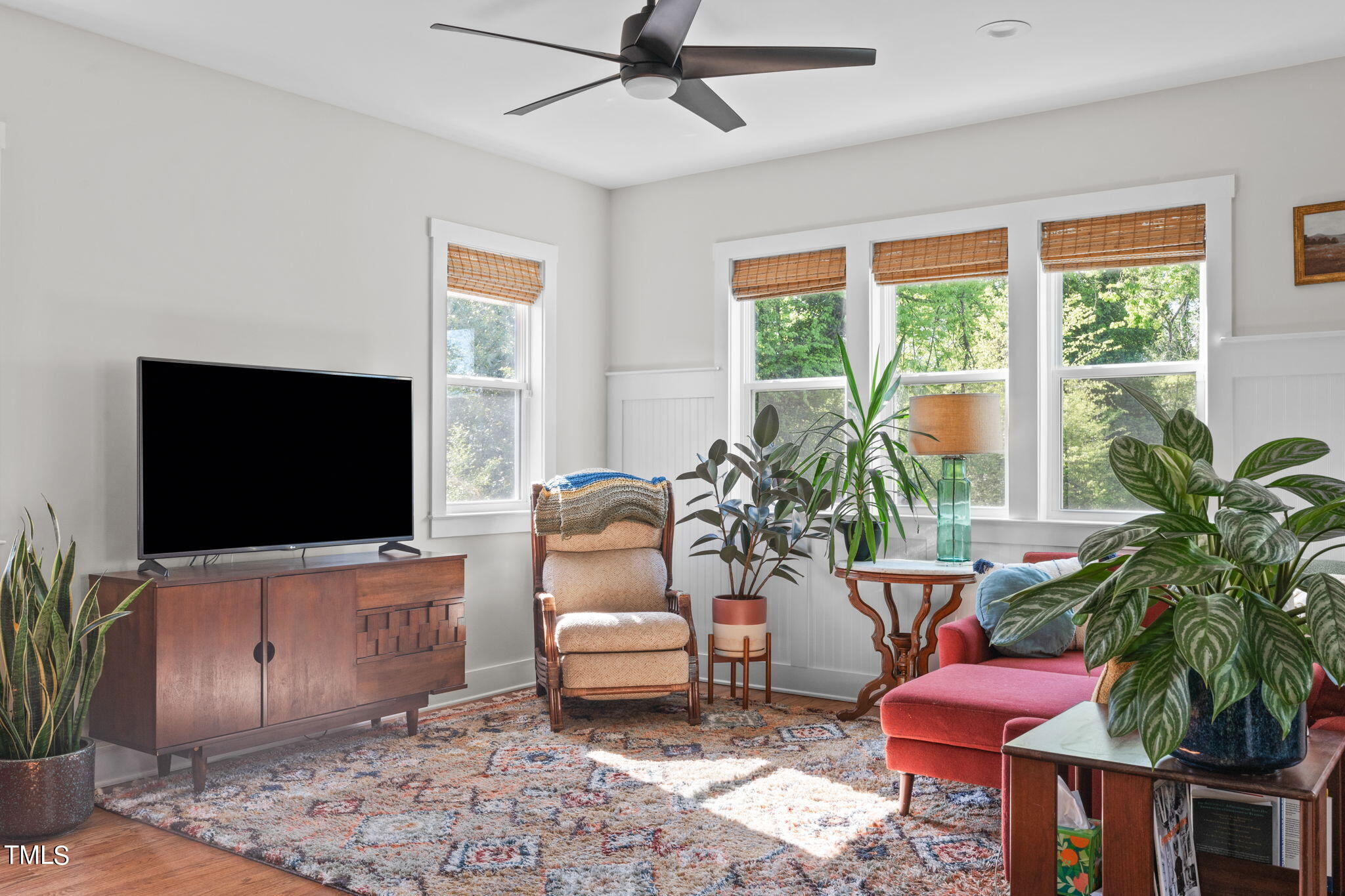 312 East Lee Street Raleigh, NC 27601 - Photo 22 of 48 a living room with furniture and a flat screen tv