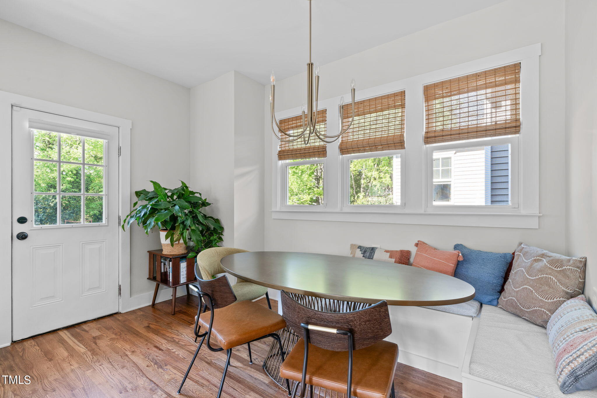 312 East Lee Street Raleigh, NC 27601 - Photo 23 of 48 a table and chairs in a room with a window