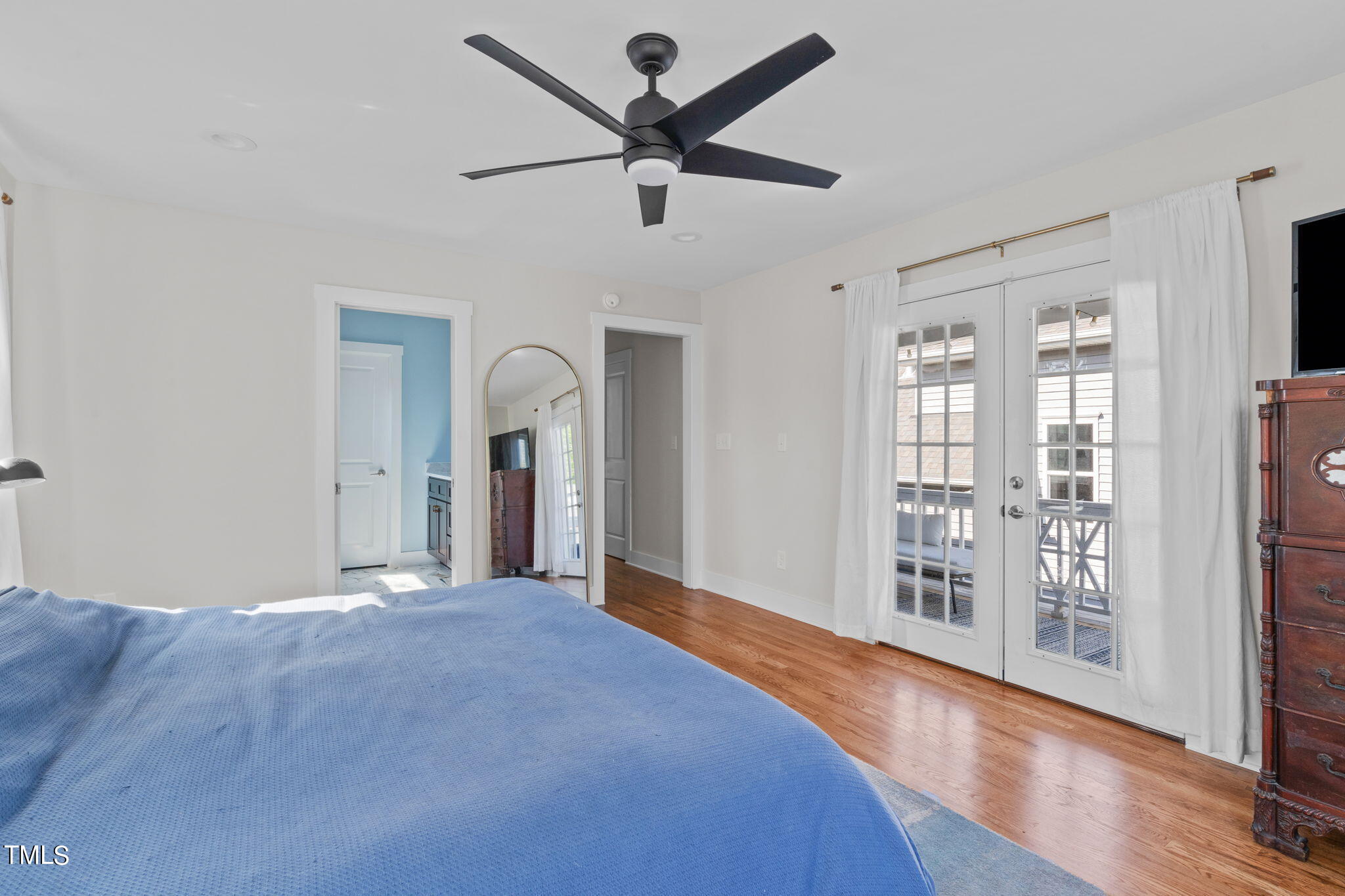 312 East Lee Street Raleigh, NC 27601 - Photo 30 of 48 a view of a livingroom with a ceiling fan and window