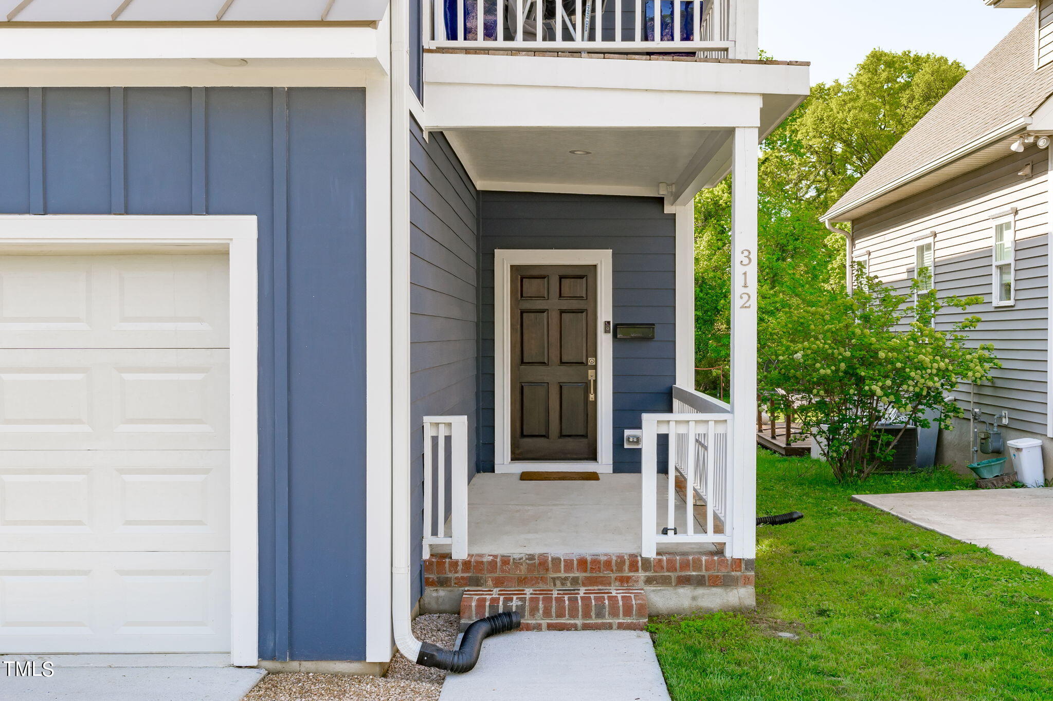 312 East Lee Street Raleigh, NC 27601 - Photo 3 of 48 a view of entrance front of house