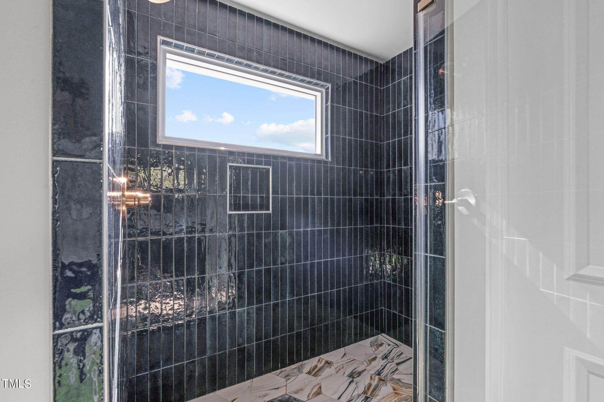 312 East Lee Street Raleigh, NC 27601 - Photo 33 of 48 a bathroom with a shower