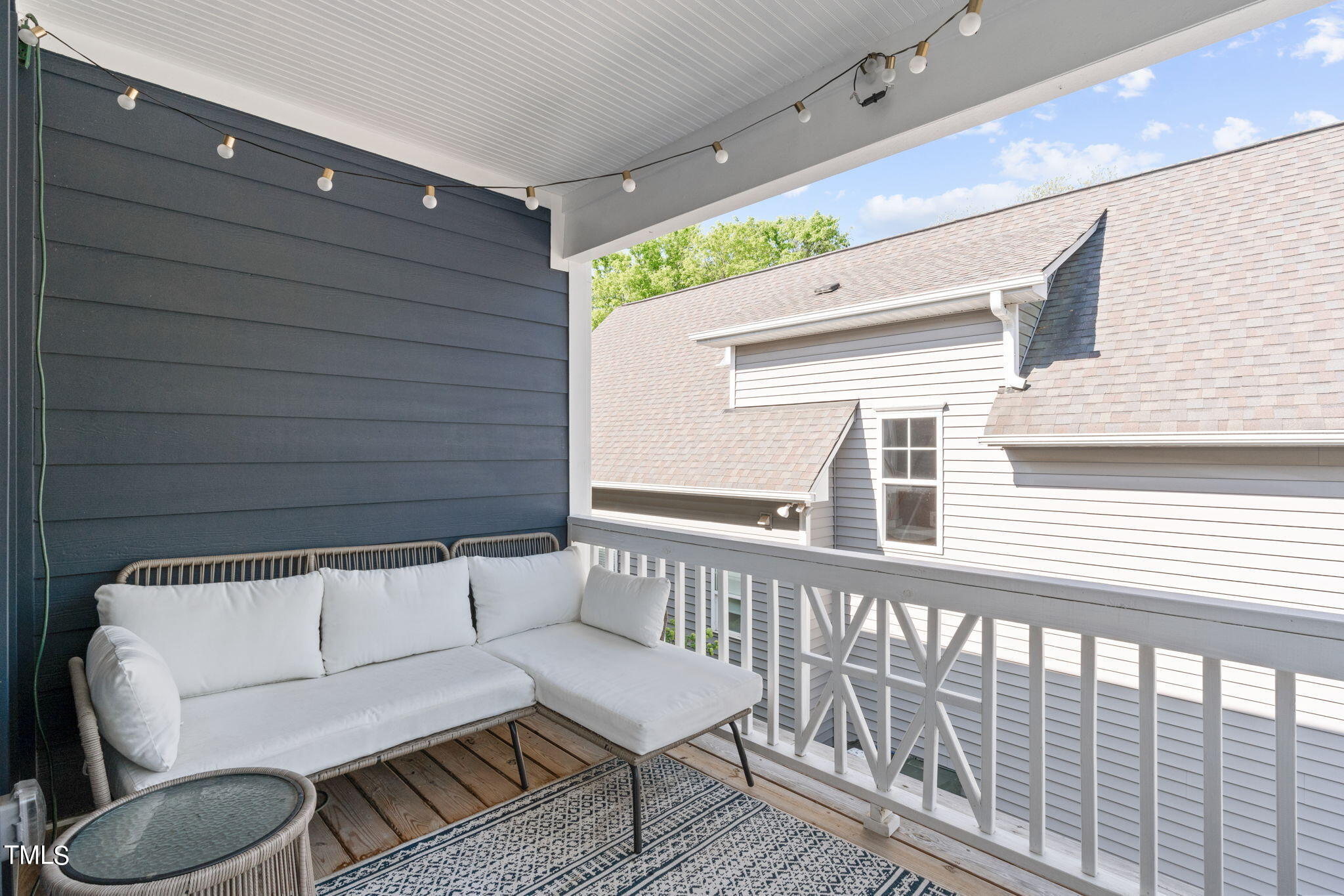312 East Lee Street Raleigh, NC 27601 - Photo 35 of 48 a balcony with wooden floor and outdoor space