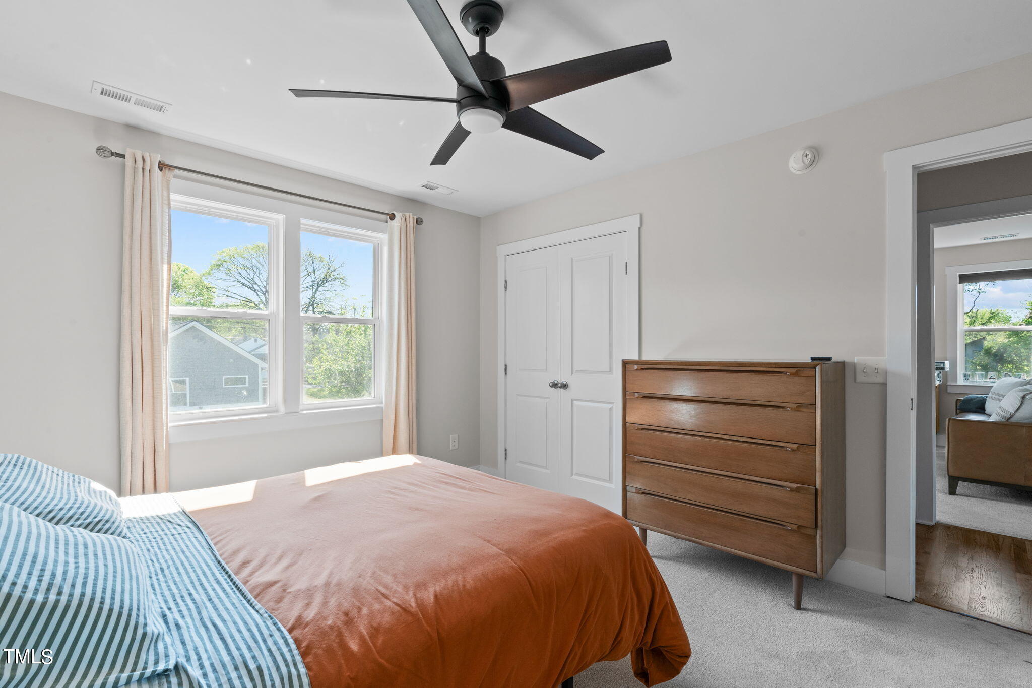 312 East Lee Street Raleigh, NC 27601 - Photo 40 of 48 a bedroom with a bed and a dresser