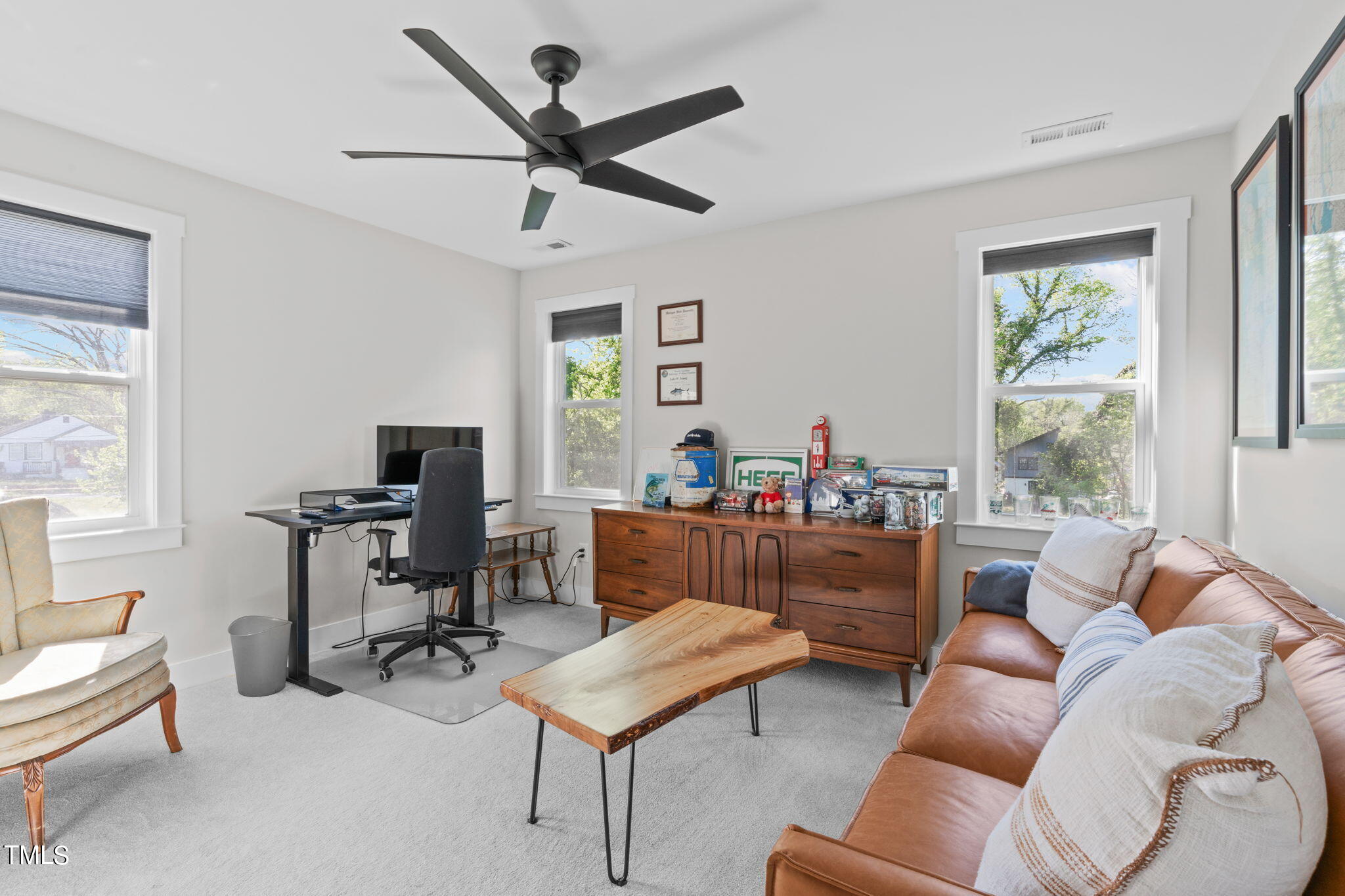 312 East Lee Street Raleigh, NC 27601 - Photo 41 of 48 a living room with furniture and a window